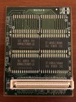Un-moddified memory upgrade board for an Apple Powerbook 1400c laptop.